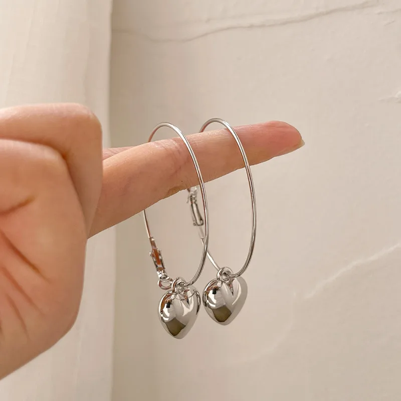 

Kshmir New exaggerated metal heart - shaped earrings women contracted earrings temperament web celebrity earrings jewelry gifts