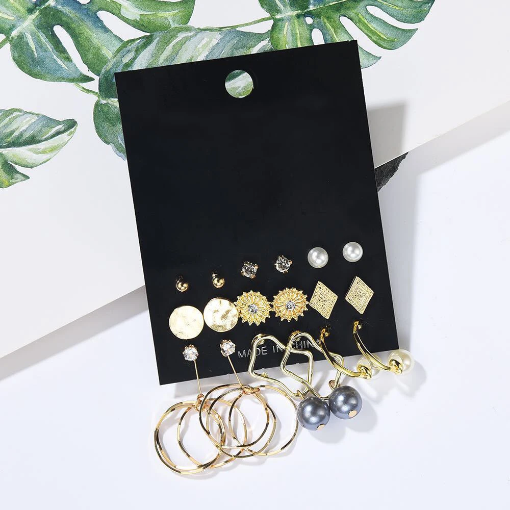 Сережки в виде жемчужных алмазов комбинация золотистого элегантного 9