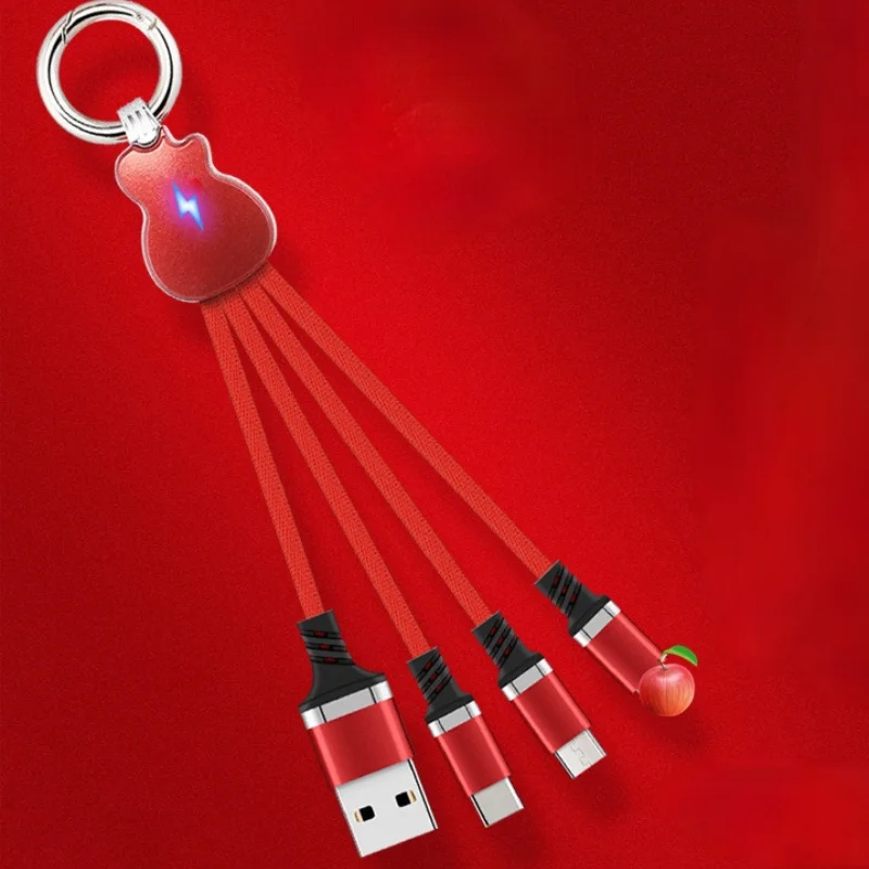 

Three-in-one Portable Fashion Guitar Keychain Luminous LED Light for Mobile Phone Charging with Three Data Cables