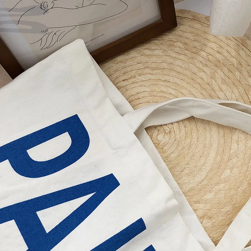 

2021 New Personality Letter Canvas Simple Print Retro Commuter Portable Shopping Hand Carry Women Designer Underarm Shoulder Bag