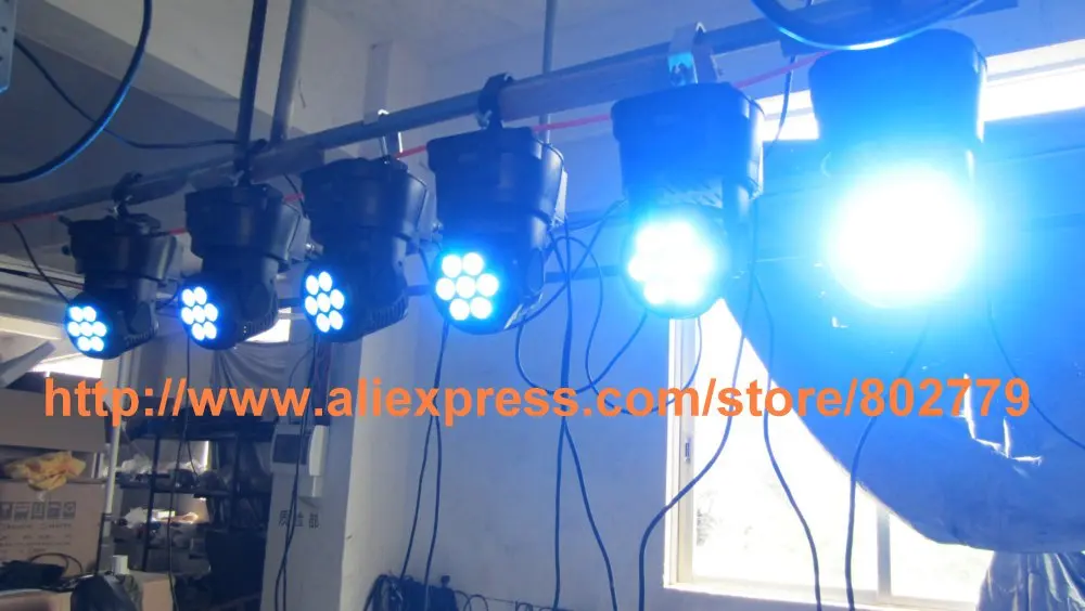 

Free Shipping Wholesale ( 8 pcs / lot ) 7*12W RGBW 4 in 1Mini Moving Head Light LED Moving Head Ligh AC 110V - 220V