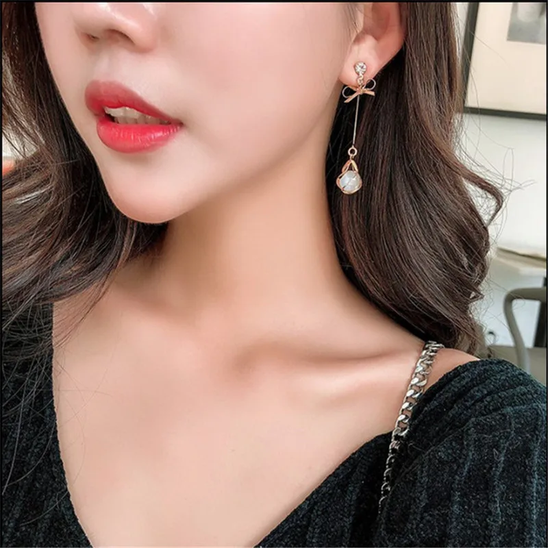 

Opal Female Butterfly Combined with gold Earrings Simple Personality Wild Temperament Tassel Woman Earrings Give Gifts to Women