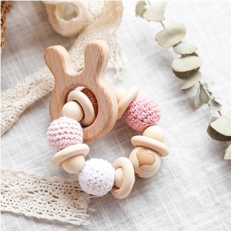 

Wooden Rattle Teether Baby Toys Crochet Beads Baby Teether Baby Nursing Bracelet Rattle Chewable Teething Beads For Kids Gifts