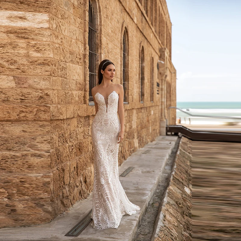 

Elegant Slim Mermaid Lace Sleeveless Bride Wedding Dresses Beaded Jewel Neck Bridal Gowns Illusion Buttons Back Sweep Train