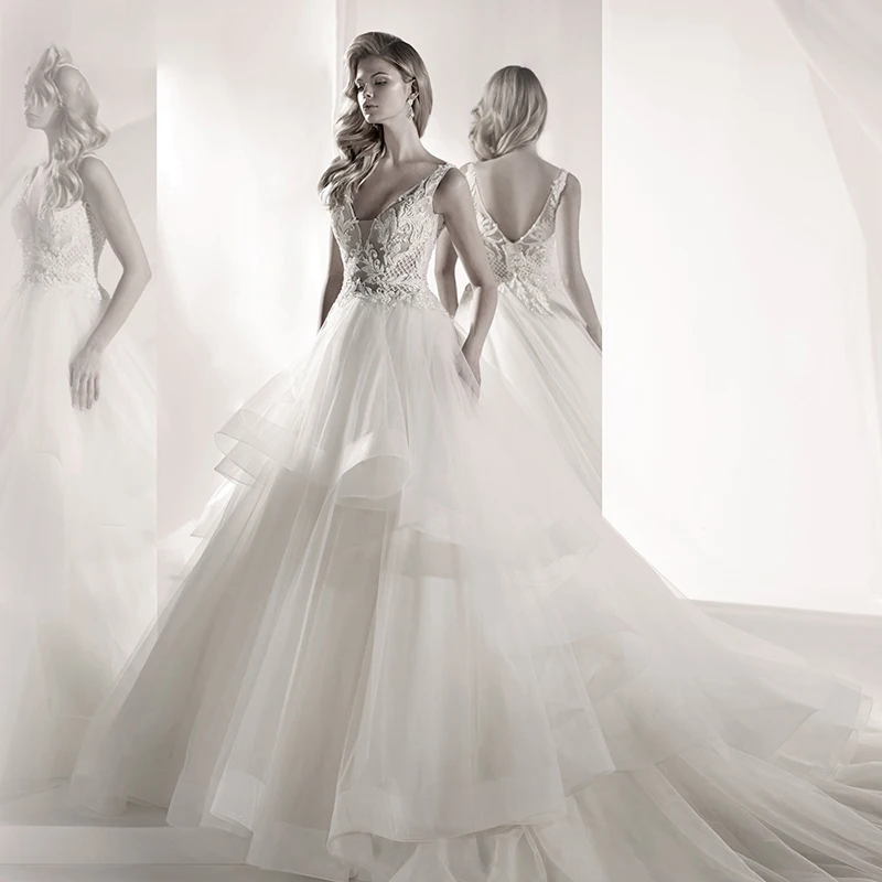

Retro Grace White Wedding Dress Lace V-neck Sleeveless Backless Bridal Dresses Plus Size Tail Wedding Gown