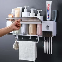 new magnetic adsorption toothbrush holder automatic toothpaste dispenser toiletries storage rack bathroom accessories