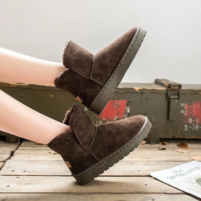 

Snow boots women short warm cotton shoes in winter the new fashion thickening and velvet flat leather waterproof