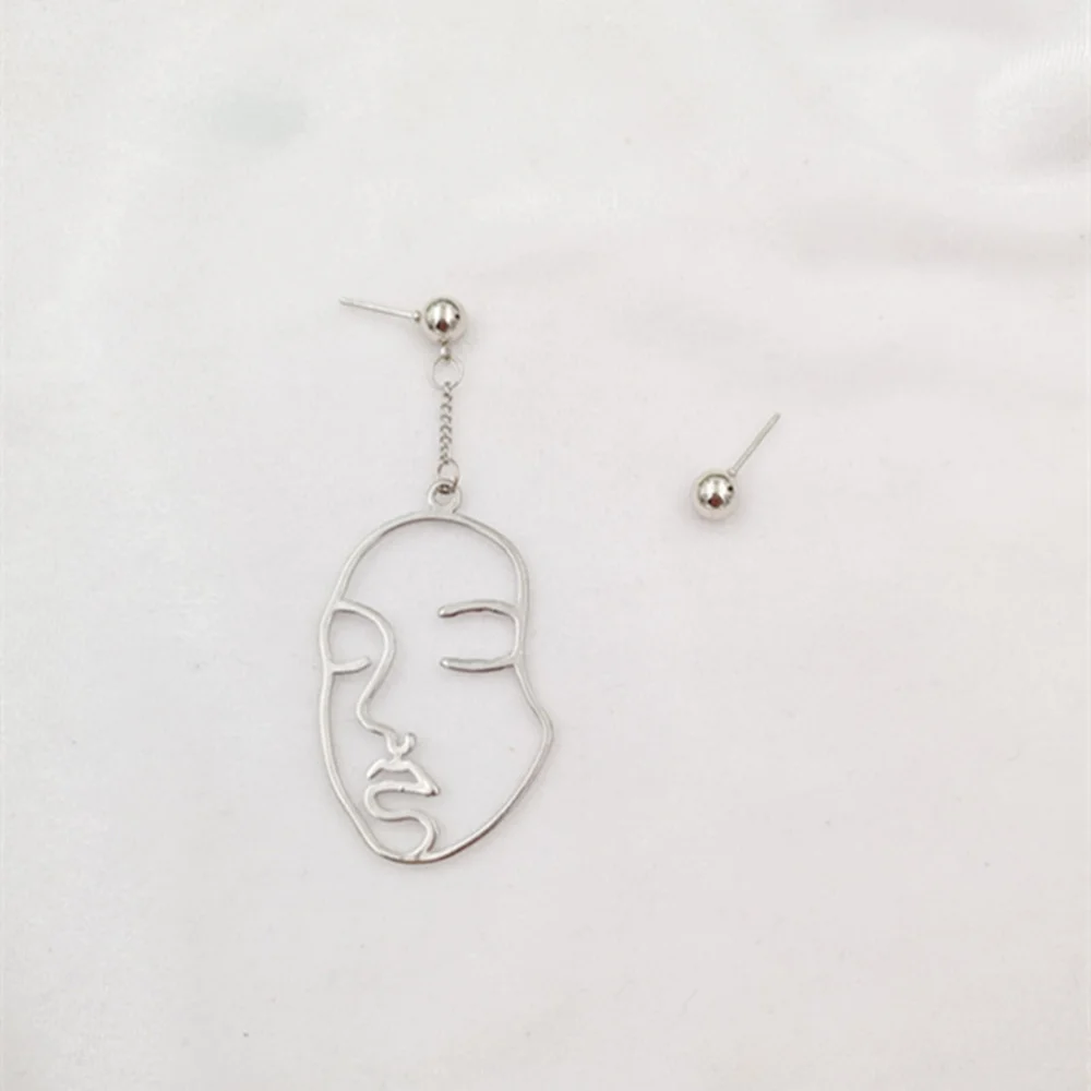 Женские абстрактные асимметричные серьги длинные висячие в форме лица (золотые) |