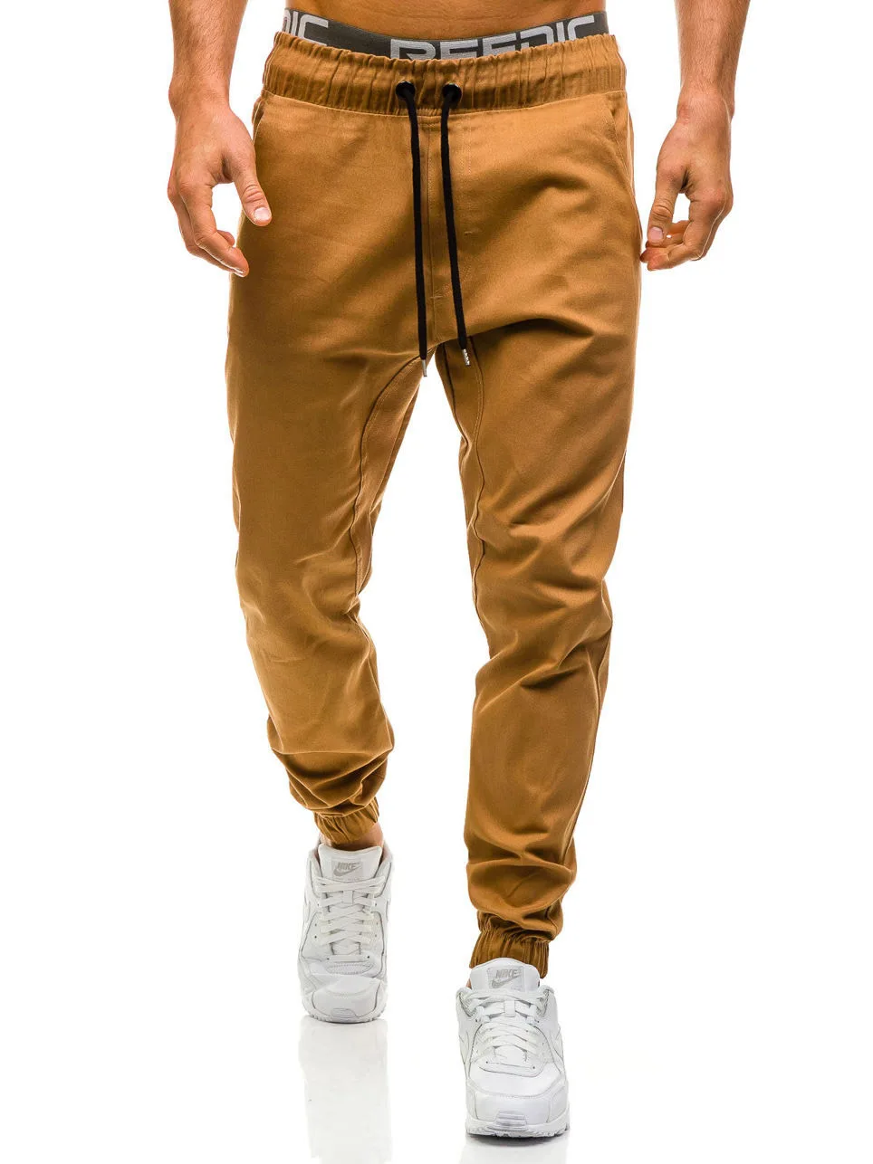 

2021 new large size European and American men's pure color trend fashion rope elastic belt small feet casual pants