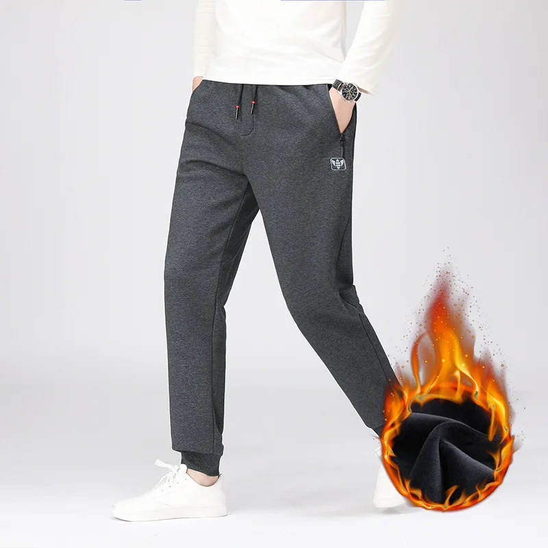 

Autumn and winter new men's fattening plus size sports casual knitting close up Plush sports pants men's thickened warm pants