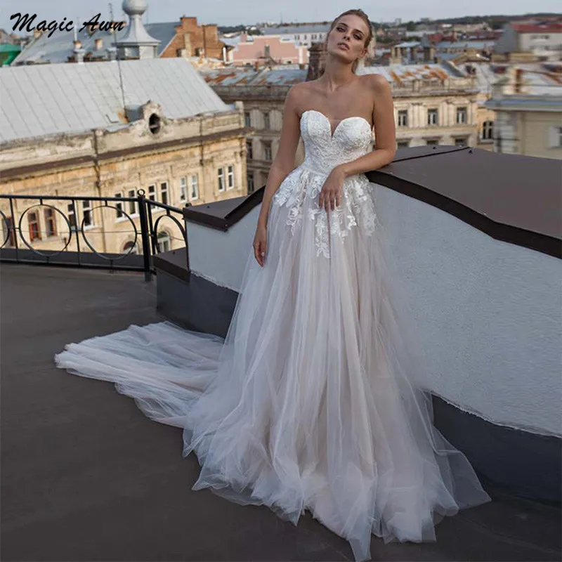 

Magic Awn 2021 Beach Wedding Dresses Champagne Lace Appliques Illusion Sweetheart Boho A-Line Bridal Gowns Princess Robe Mariage