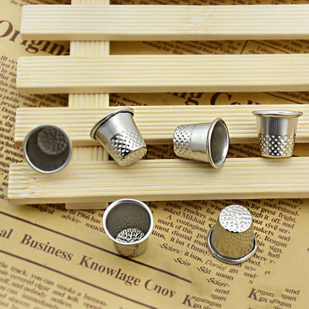 

10PCS New Silver Sewing Machine Handworking Pin Needle Craft Tools Metal Finger Thimbles Tailor Sewing Grip Shield Protector