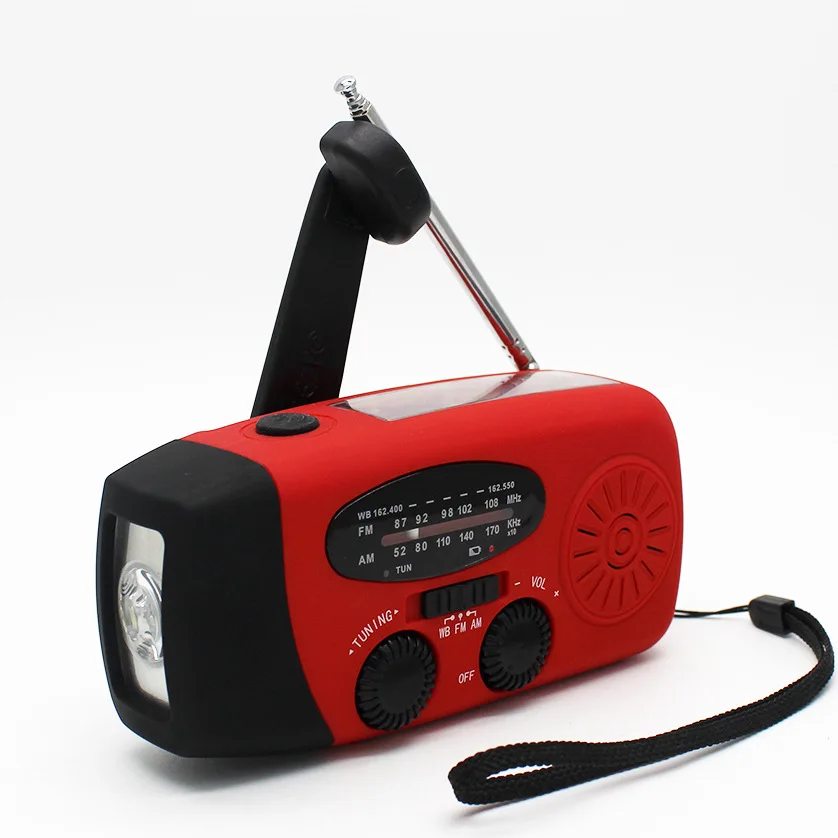 Портативный ручной радиоприемник на солнечной батарее с динамометрической