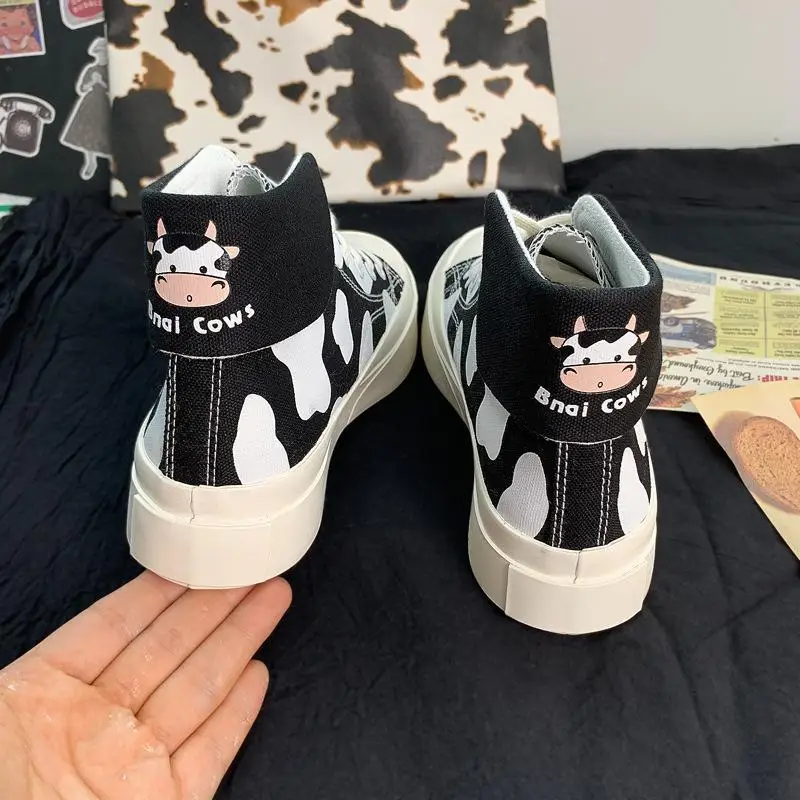 

Korean cow cute cartoon high-top canvas shoes female spring 2021 thick-soled wild white shoes big-toed shoes