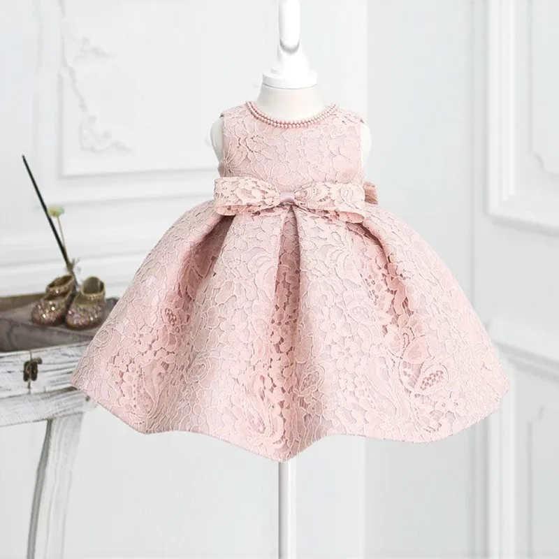 Детское кружевное платье принцессы розовое с бантом и бусинами для крещения на 1