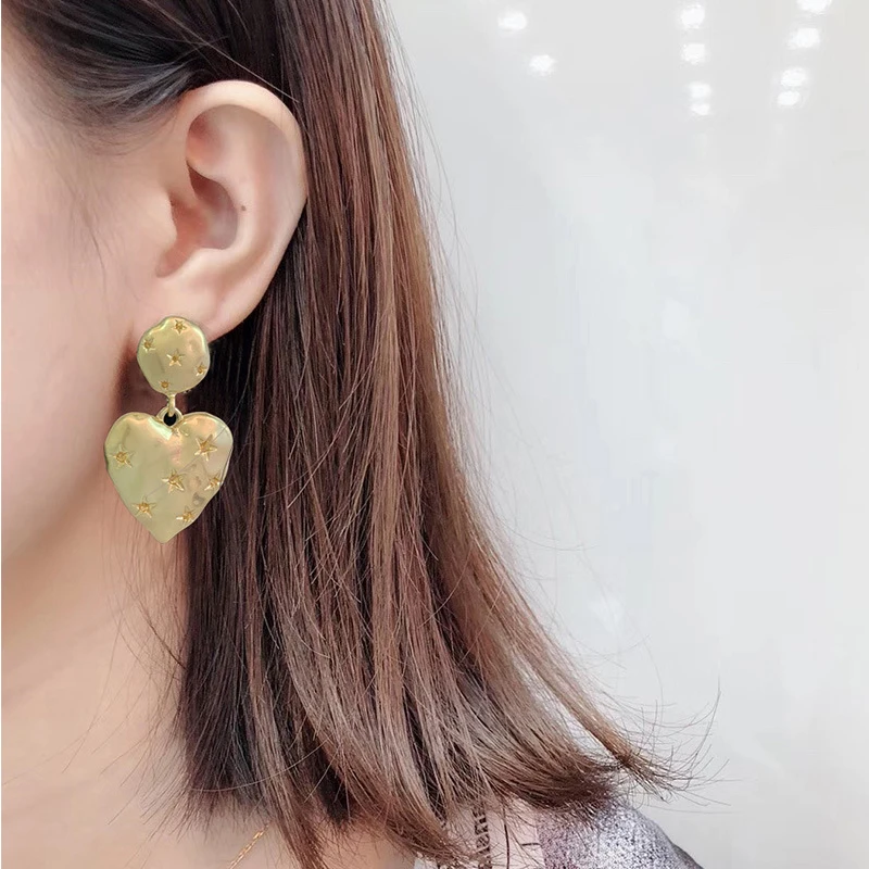

Light luxury metal Star heart earrings woman exaggerated big Peach Heart earrings Popular nightclub earrings for women Jewelry