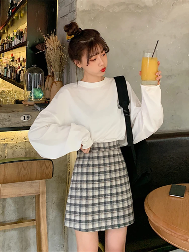 

2021 new high-waisted and thin-hit color plaid A-line package hip skirt fashion student half-length skirt female