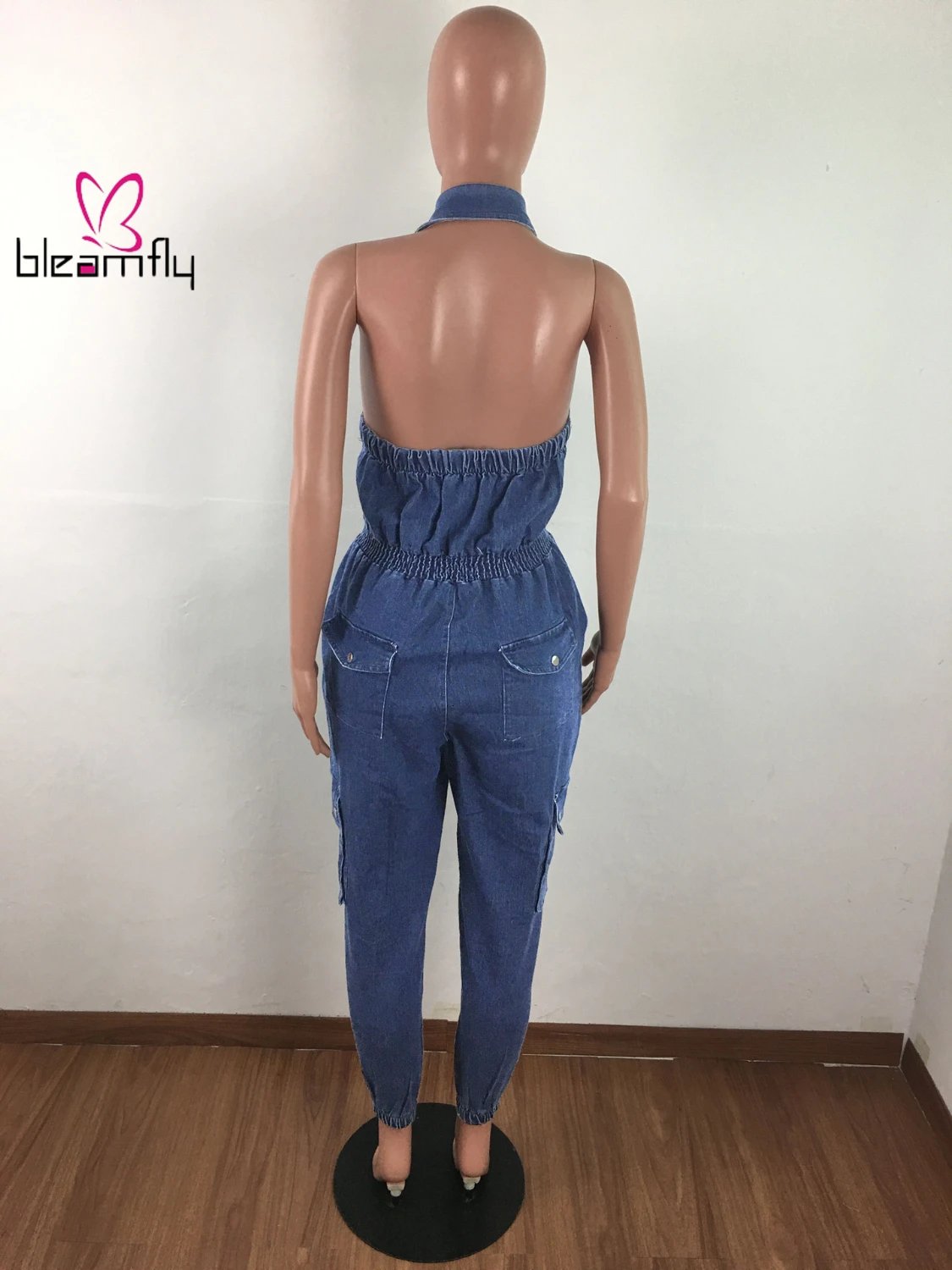 Осенне зимний женский джинсовый комбинезон на пуговицах без рукавов с открытой