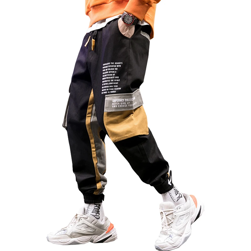 

Мужские брюки-карго в стиле хип-хоп, черные джоггеры, спортивные брюки, комбинезон, Мужская Уличная одежда с лентами, брюки-султанки, модные ...