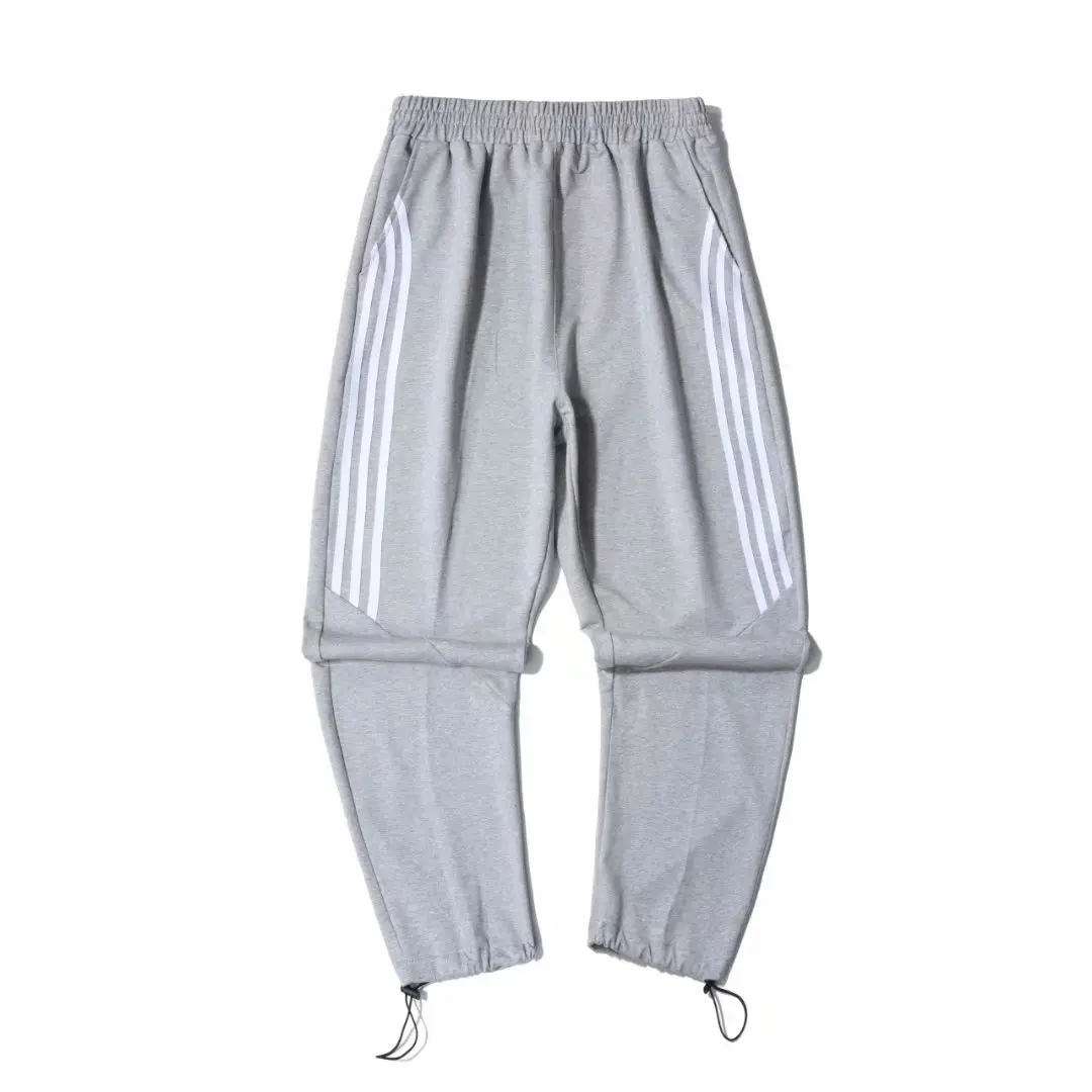 

2021 men's new training pants with three side toe band rope jogging pants with pocket elastic outdoor fitness pants pencil pants