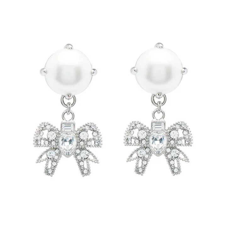

The new butterfly crystal pearl earrings with a hundred touches bow earrings