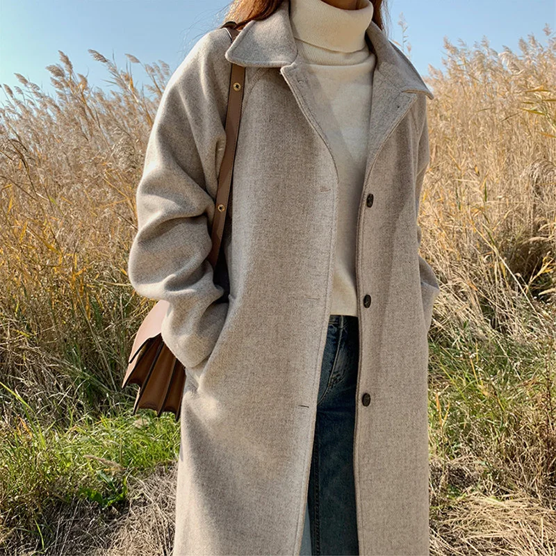 Женское элегантное зимнее шерстяное пальто черного и коричневого цветов длинное