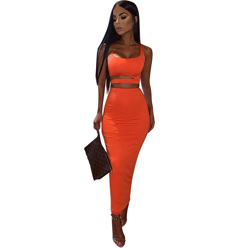 

Women Solid Color 2 Pieces Sets 2021 Summer Sexy Hollow Out Strap Crop Top High Waist Midi Skirts Slim Streetwear Skirts Set