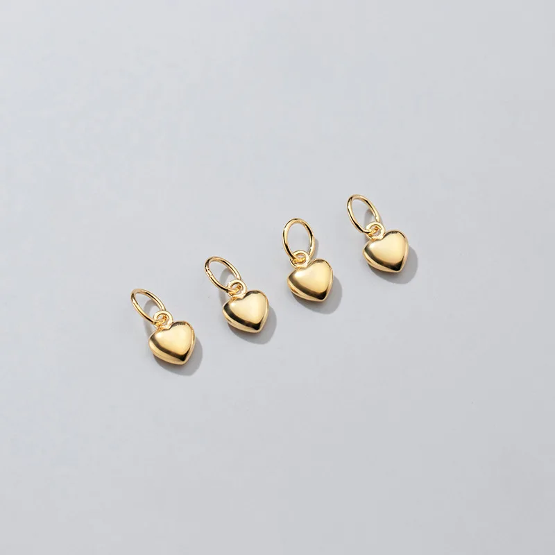 Подвеска в виде сердца из серебра 925 пробы с золотым/платиновым/розовым золотом 1