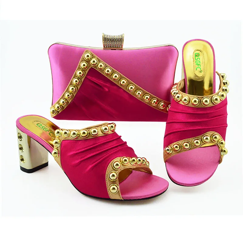 

Italian Design Nigerian Fashion Shiny Rivet Style Women Shoes and Bag Set With Streamer modeling