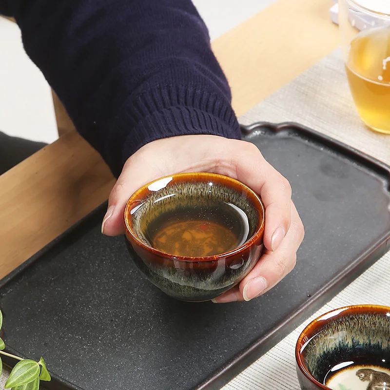 

The 12 Chinese Zodiacs Tea cup china's traditional mascot Kiln Change Ceramic Like the color of placer gold ,kung fu tea set