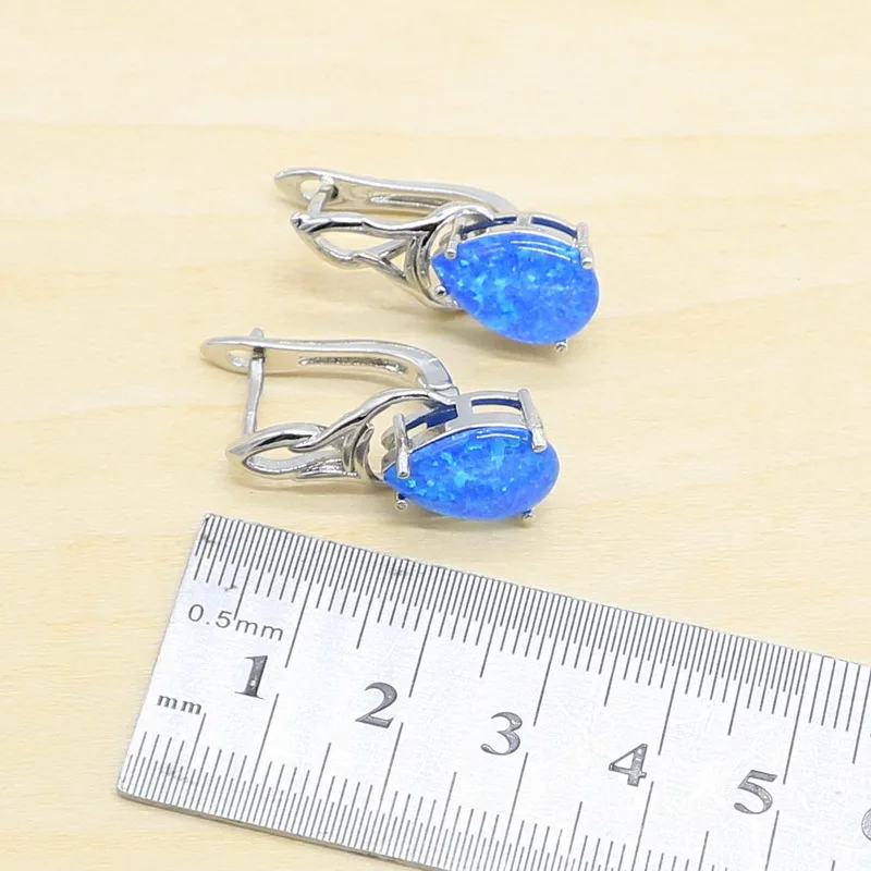 Женский ювелирный комплект из колье и серёг с голубым опалом | Украшения