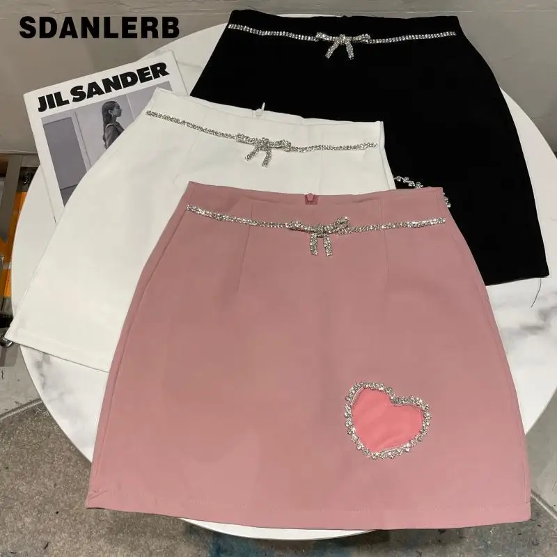 

Women Mini Skirt 2021 Autumn New Rhinestone Hollow Out Drill Chain Grinding Design Solid Color Short A- Line Skirt Faldas Mujer