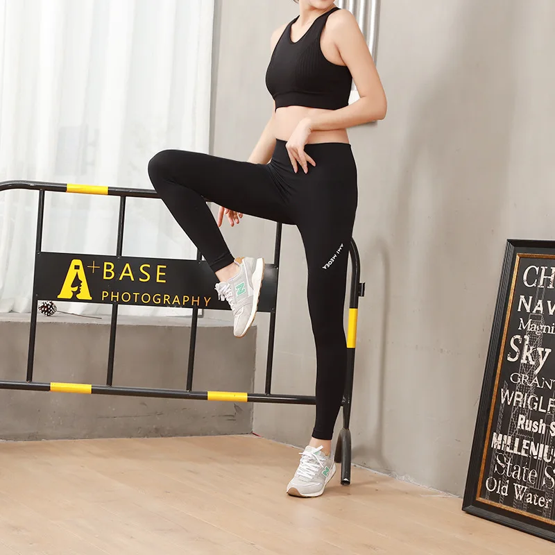 

WILK new fitness running breathable high elastic leggings sports letters small feet tight yoga pants