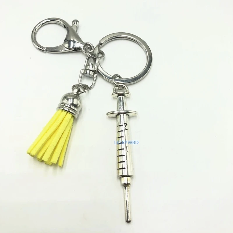 

New Personality Tassel Ambulance Nurse Medical Kit Creative Keychain Stethoscope Needle Syringe Diagnosis Keychain Best Gift.