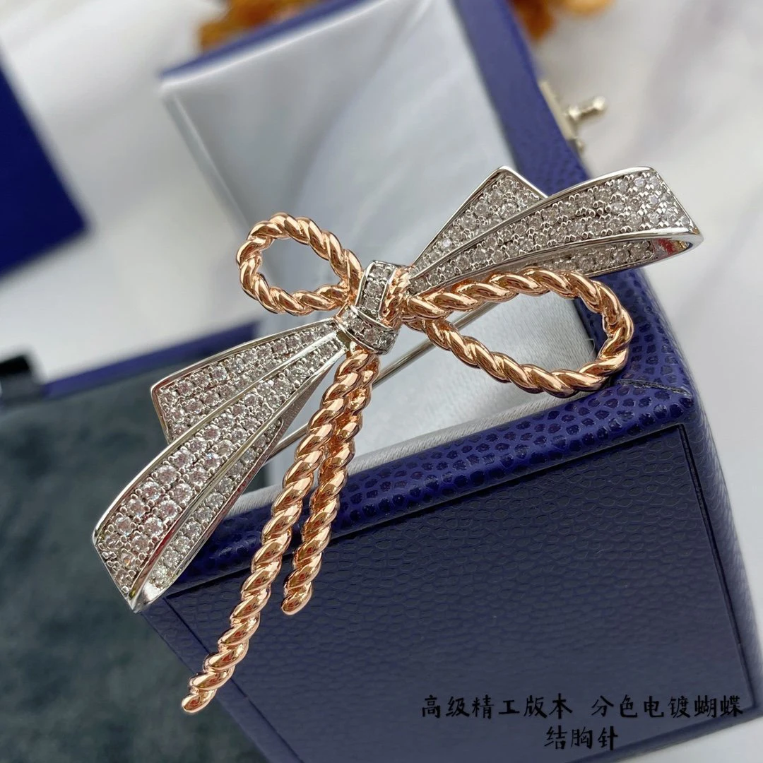 

Top Quality Luxury Brand Double Bow Cross Brooch Steel Inlaid Glittering Diamond Full Of Glittering Ice Flower