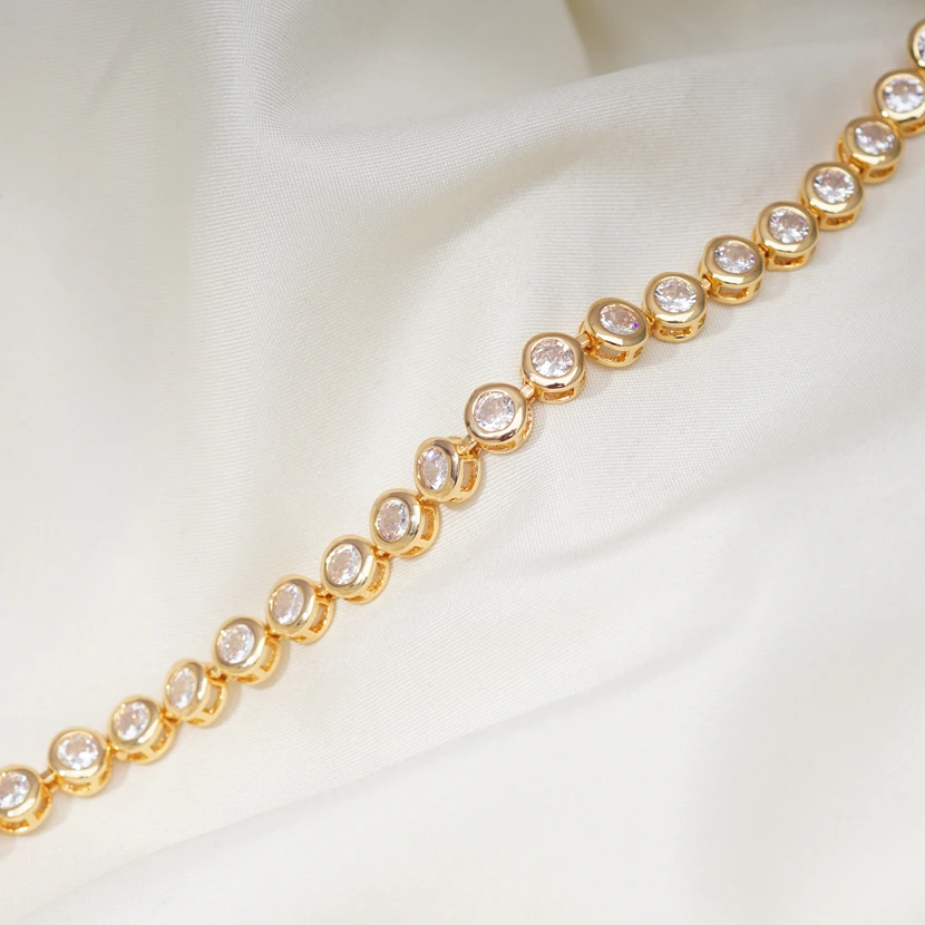 Браслет цепочка женский круглый из меди и золота со сверкающими