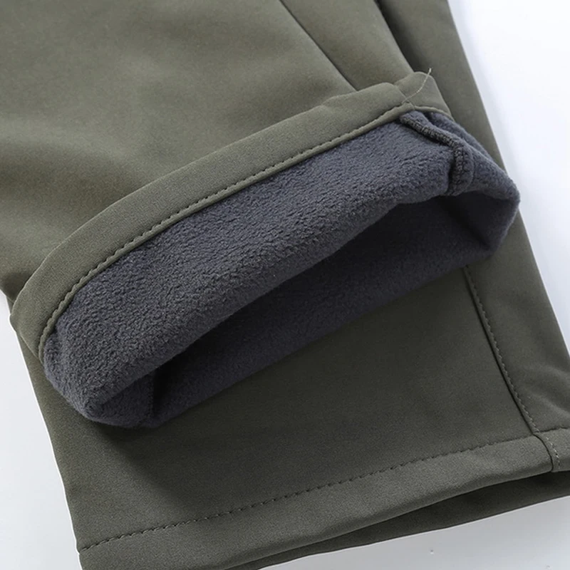 

Pantalones elsticos impermeables para hombre, pantaln de chndal informal, grueso y clido, con forro polar de piel de tiburn,