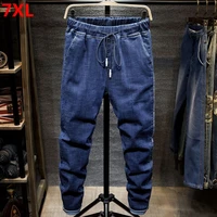 large size jeans black mens man plus size harem pants autumn elastic stretch slim feet trousers 7xl 6xl 5xl