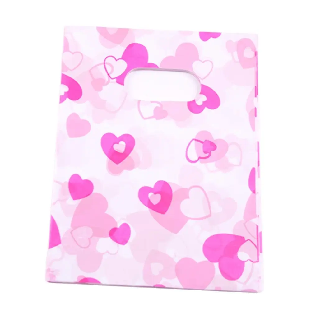 

Plastique Christmas Packaging Bags with Pink Heart Favor Party Gift Package Wholesale 100pcs/lot 15*20cm