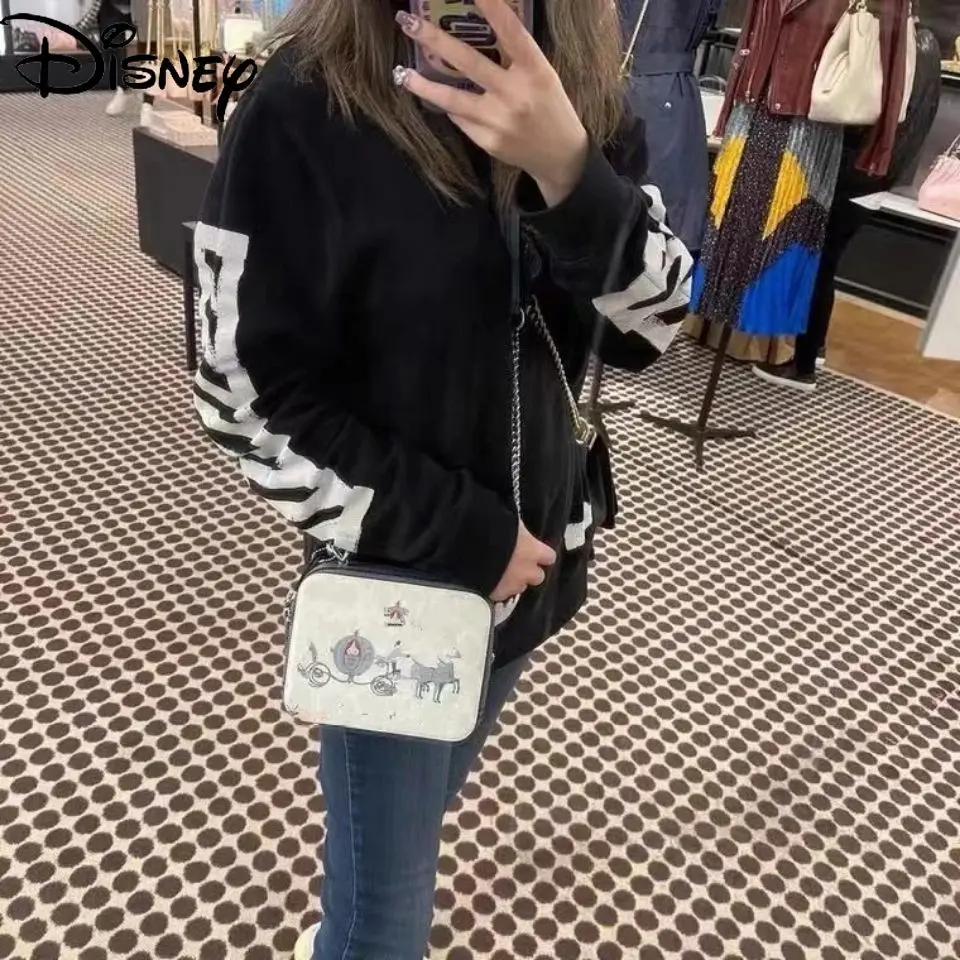 

Disney ladies fashion new 2021 cute cartoon printed shoulder bag messenger bag simple casual double zipper small square bag