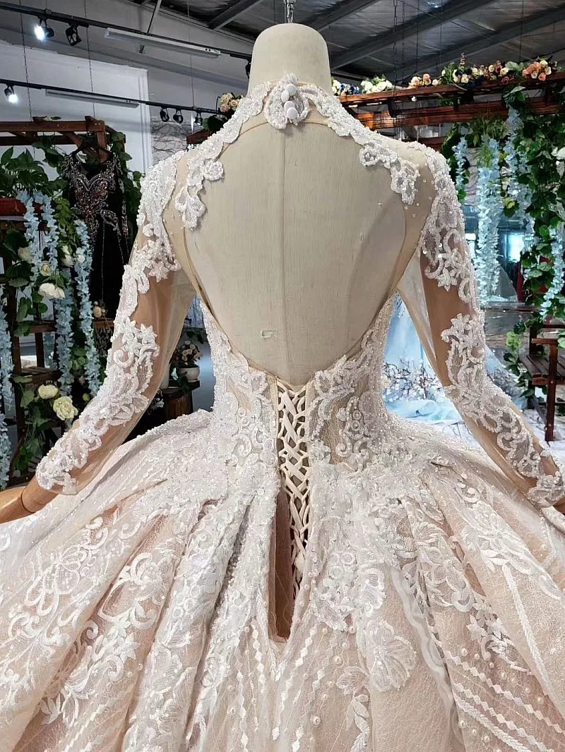 BacklakeGirls 2020 New Deep V Neck Organza Ball Gown Appliqued Beaded Sequins Muslim Wedding Dresses Long Sleeve Hollow Out Back |