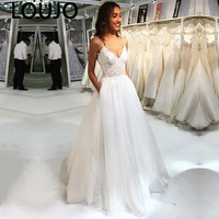 luojo wedding dress spaghetti strap v neck appliques lace top tulle skirt backless wedding gowns with pockets robe de mariage