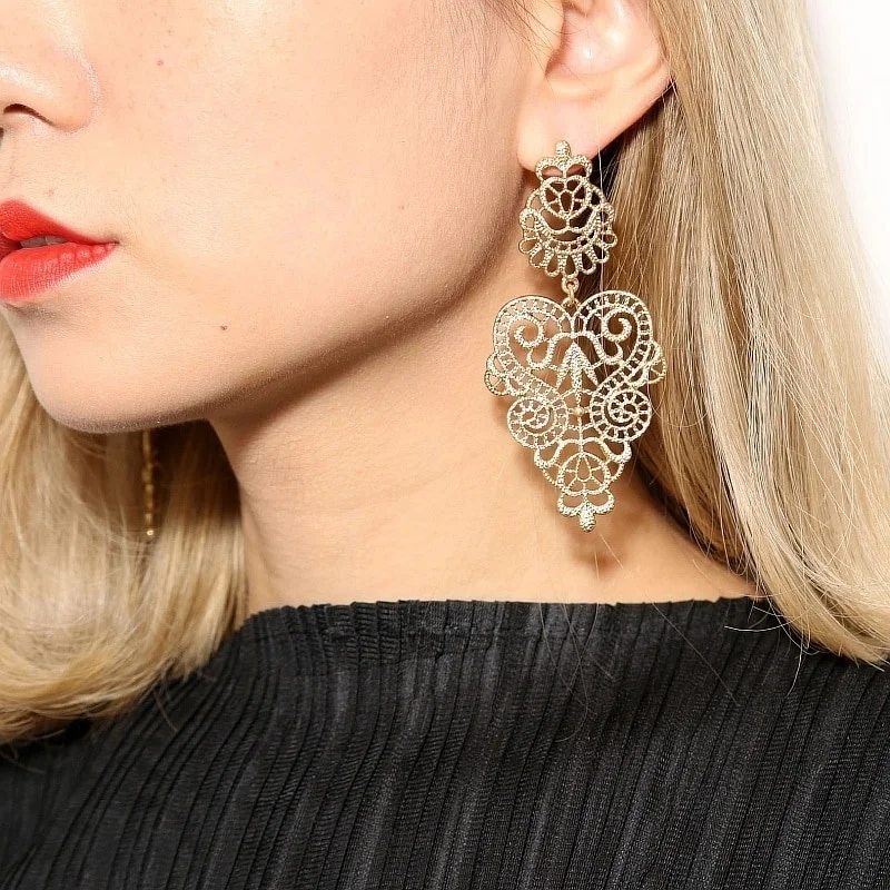 

2021 New Temperament All-match Bohemian Hollow Leaf Dangle Earrings