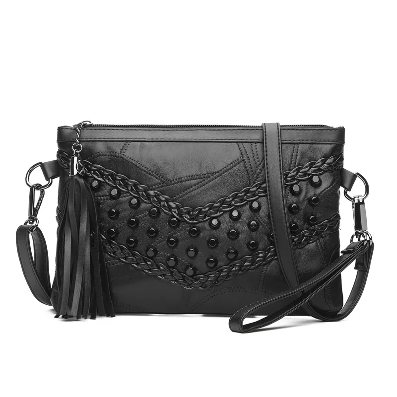 This is a soft sheepskin crossbody bag with rivets, tassels and splicing design elements. It is a stylish shoulder bag.This Gift