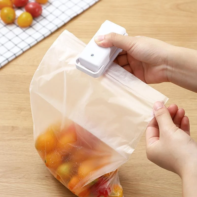 

Portable Mini Sealer Home Heat Bag Plastic Food Snacks Bag Sealing Machine Food Packaging Kitchen Storage Bag Clips Wholesale