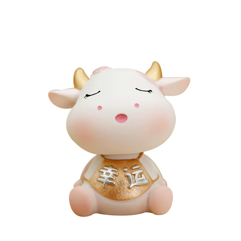 

Cow ornaments car contained resin shaking head cartoon ox cart pendulum holiday creative gifts creative gifts birthday gifts