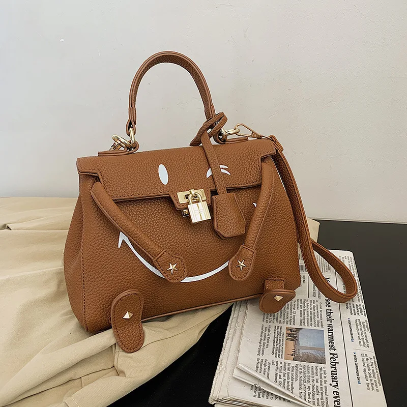 

Women's bag 2021 new smiling face bag foreign style fashion handbag one shoulder straddle women's bag luxury designer handbag