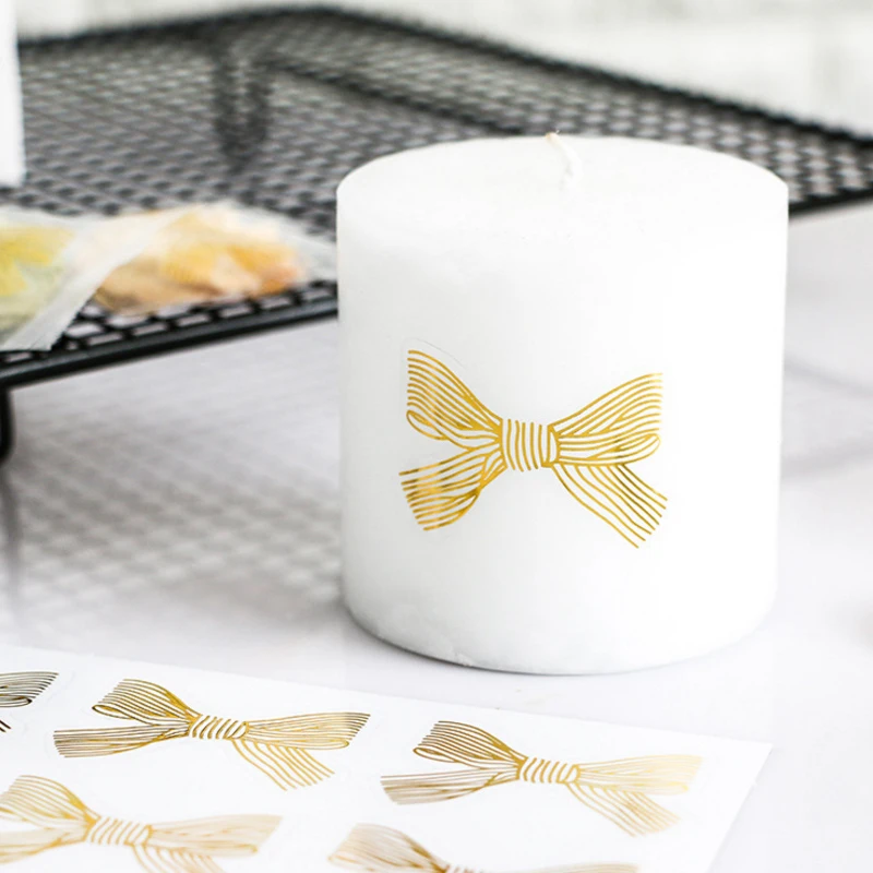 Этикетки с золотыми бантами 60 шт./упак. бронзовые прозрачные для скрапбукинга