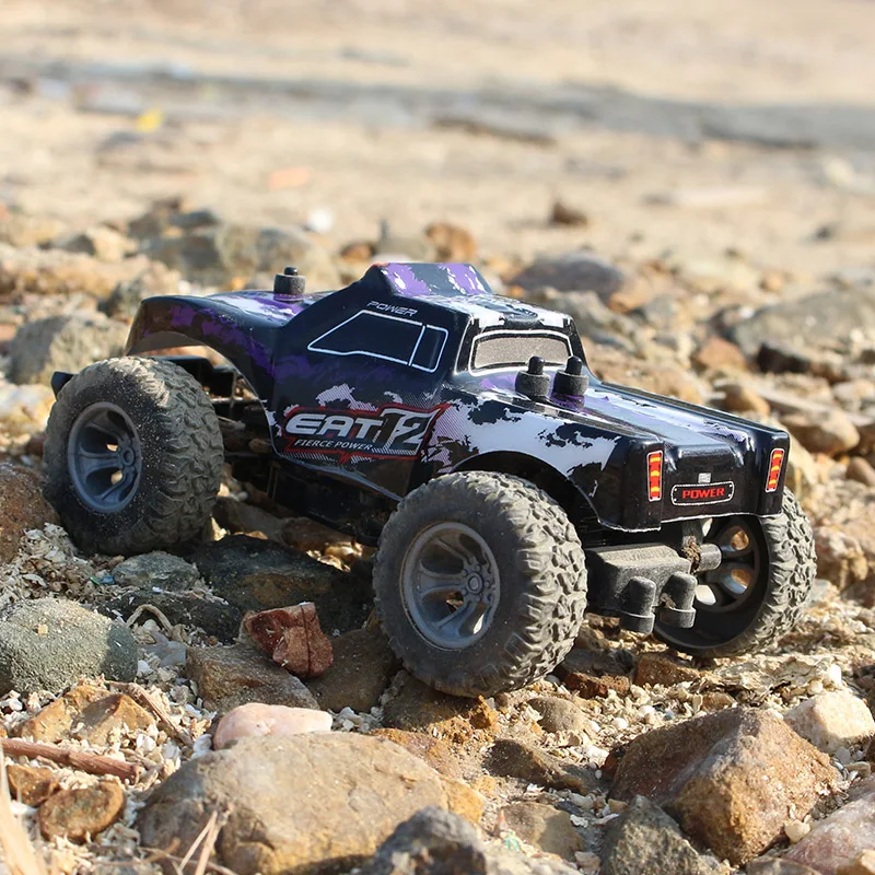 

Eachine EAT12 1/28 RC Car 2.4G High Speed Drift Waterproof RTR Strong Power 35km/h Off-road Shock Absorber Vehicle Model Toys