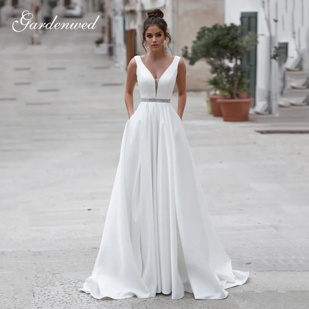 

Simple White V Neck Satin Wedding Dress Backless Pleats A Line Bridal Gown Custom Made Bride Dress with Pockets